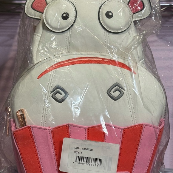 Loungefly Handbags - Universal Studios Loungefly – Fluffy Unicorn Cupcake Mini Backpack